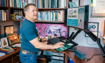 UNCG Professor Creates Well-being Initiative Through Fist Bumps