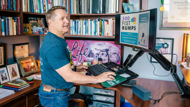 UNCG Professor Creates Well-being Initiative Through Fist Bumps